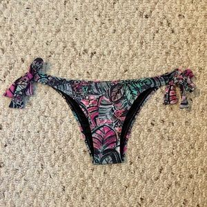 Pualani bikini bottoms - large - new without tags - adjustable tie sides